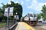 NJT Train # 1605 arriving into the depot behind PL42AC # 4028 